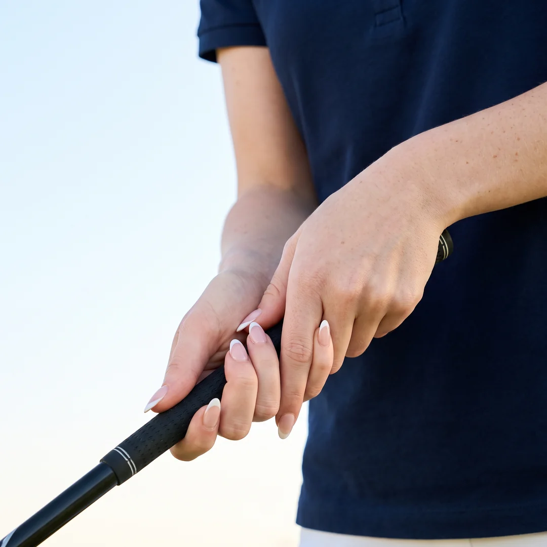 Close-up of an overlapping golf grip